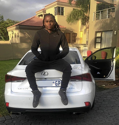 Chiefs player Siphiwe Tshabalala with his sponsored Lexus. / Instagram