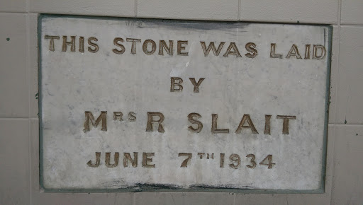 A plaque on the exterior of the Moonah Hotel, Main Road, Moonah, Tasmania. It reads: THIS STONE WAS LAID BY MRS R SLAIT JUNE 7TH 1934 There seems to be little information about Mrs R Slait or why...