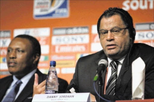 FACING THE MEDIA: Local Organising Committee's chairperson Irvin Khoza and its chief executive Danny Jordaan at a press conference held at Cape Town's International Convention Centre. Pic: VELI NHLAPO. 04/12/2009. © Sowetan,.
