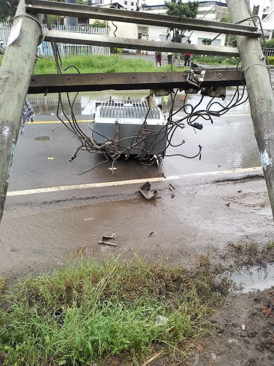 Kenya Power electricity transformer, posts and wires falls on Arwgings khodek near Yaya Centre on May 4, 2024 as a result of heavy rains.