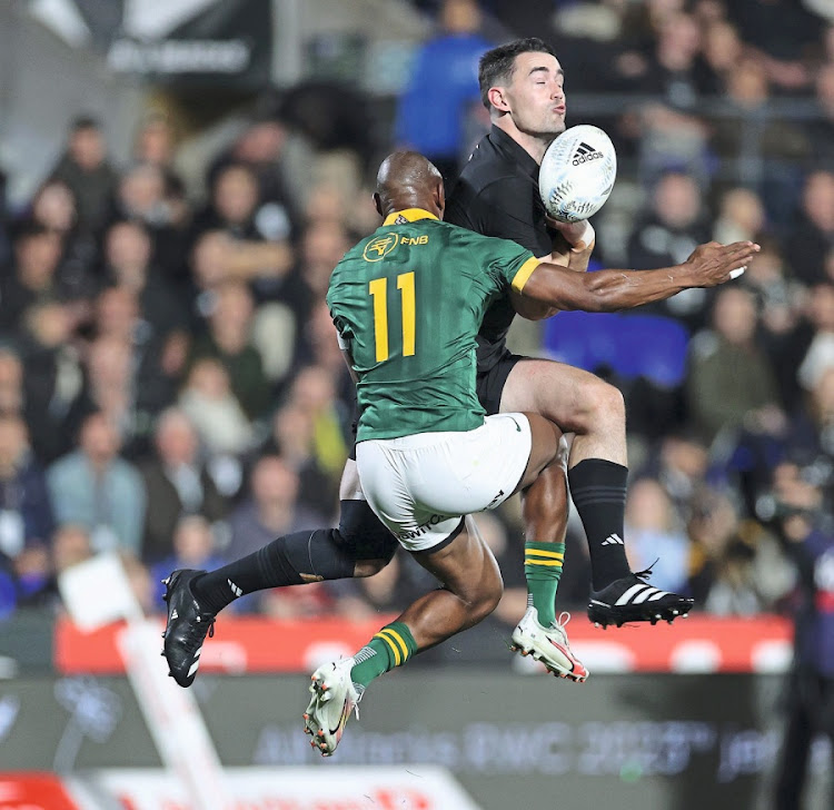 Aerial battle: Will Jordan of the All Blacks competes for the ball against Makazole Mapimpi. Picture: Gallo Images/Getty Images/Fiona Goodall