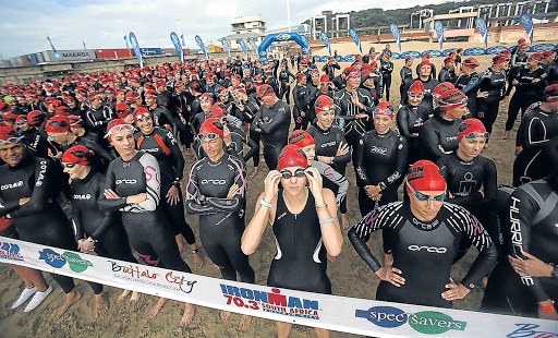 ECONOMIC BOOST: Ironman women at the start line for the Ironman 70.3 at the Orient Beach in 2013. Buffalo City Metro is bidding to host the 2018 World Championships Picture: MARK ANDREWS