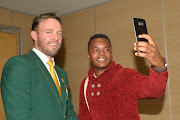 AB de Villiers taking some selfie with members of the media during the South African national cricket team departure press conference at OR Tambo International Airport, ACSA Media Centre on May 16, 2017 in Johannesburg, South Africa.