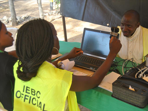 IEBC officers registers voters in Kilifi county at the start of the 30-day mass listing. /ALPHONCE GARI