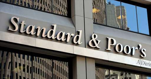 Standard & Poor’s yesterday downgraded its ratings for seven local banks to junk status