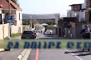 Police at the scene of the shooting of advocate Pete Mihalik, outside Reddam House school in Green Point, Cape Town. 