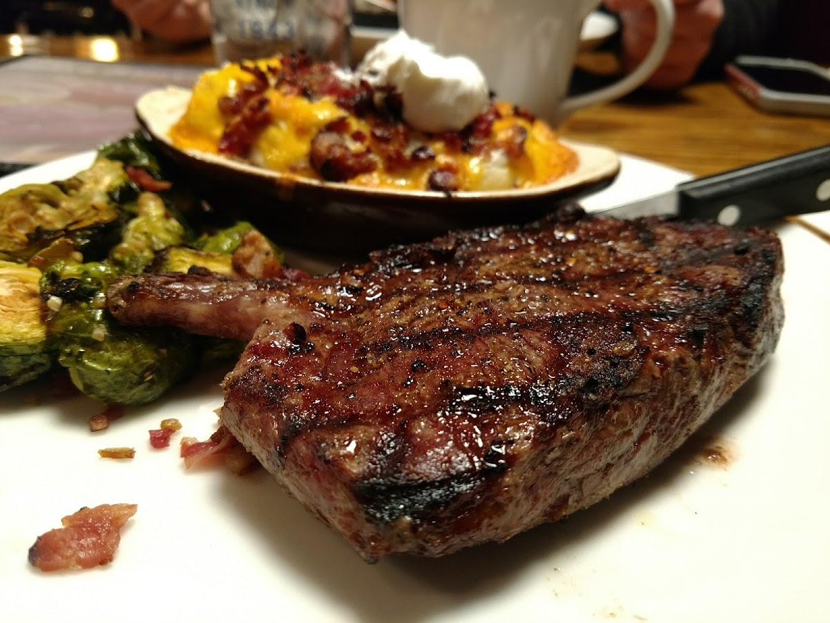 Rib Eye Steak with Skinless Bake & Roasted Brussel Sprouts with Bacon.  Very good.