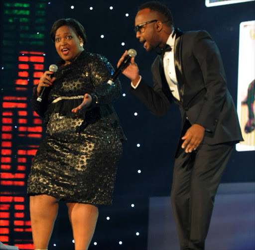 Singer Vusi Nova and Ntokozo Mbambo perform a duet at the South African Sport Awards 2013 held in Sun City. Photo: Tsheko Kabasia