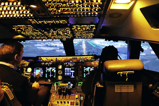 Landing practice in a Boeing 747 simulator.