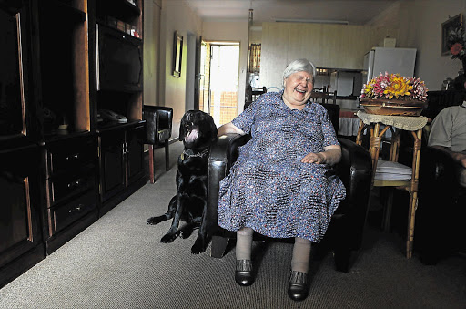 TRUSTED SERVANT: Martie Steyn with her sixth guide dog, Jabula, at her home in Pretoria, yesterday