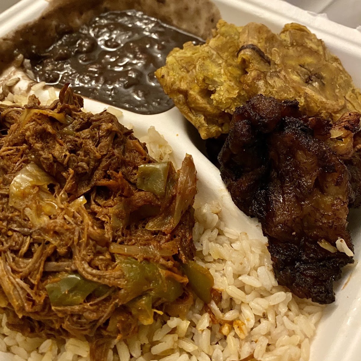 Brisket Plate with rice and beans and 2 types of plantains (takeout)