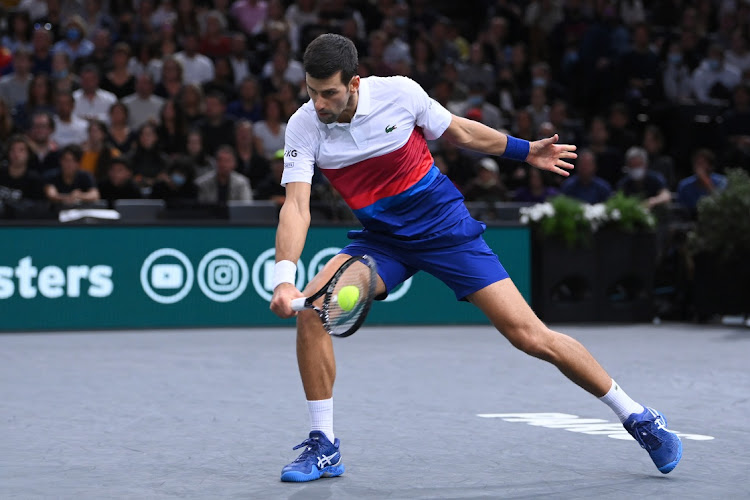 Novak Djokovic of Serbia plays a backhand during the men's singles final against Daniil Medvedev of Russia at he Rolex Paris Masters at AccorHotels Arena in Paris, France, November 7 2021. Picture: JUSTIN SETTERFIELD/GETTY IMAGES