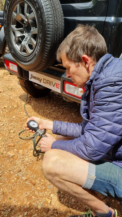 The author adjusts his tyre pressures for the practical element of the course.