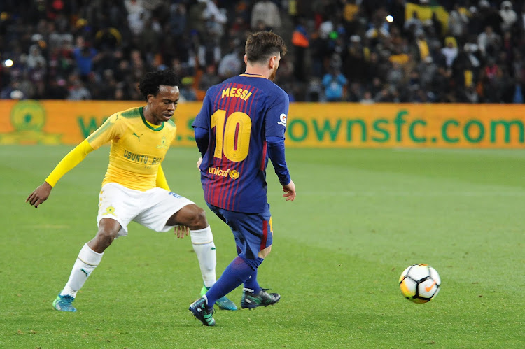 Percy Tau's Club Brugge could be drawn in the same group as Lionel Messi's Barcelona in the Uefa Champions League. Tau and previously played against Messi before.