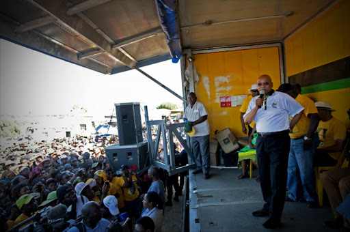 President Jacob Zuma visits Kayamandi Township on January 7, 2015 just outside Stellenbosch in Cape Town, South Africa. Zuma visited the area to encourage the community to attend the ANC's 103rd birthday celebrations which will be held in Cape Town on Saturday. (Photo by Gallo Images / Foto24 / Lerato Maduna)