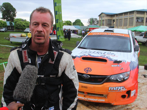 apio Laukkanen gives and interview to the media at the Meru Technical Training Institute just before being flagged off on the 3rd and final day of the 63rd KCB Safari Rally in Meru.