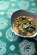Africans love adding nuts and legumes to dishes, so the peanut butter in my creamed spinach is the local twist, says cookbook author Lesego Semenya.