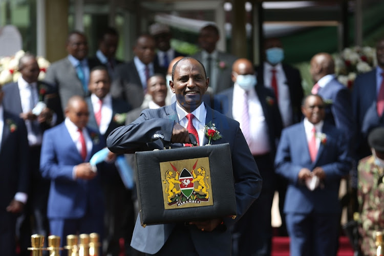 Treasury CS Ukur Yatani holding the budget briefcase for the 2020/21 financial year, in June/File