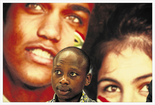 Andile Lungisa, chairman of the National Youth Development Agency, unveils the back-to-school campaign in Rosebank, Johannesburg, yesterday Picture: ELIZABETH SEJAKE