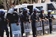 Members of the South African Police Service in riot gear Picture Credit: Anthony Molyneaux, TMG Multimedia