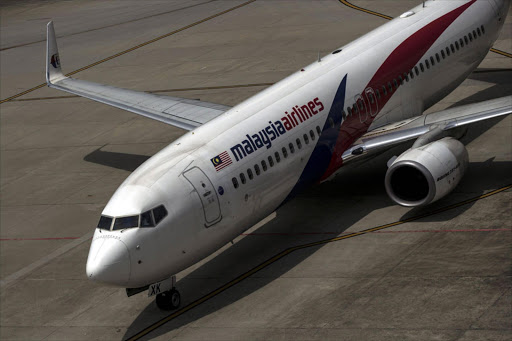 A Malaysia Airlines aircraft is seen at Kuala Lumpur International Airport. Photo: EPA/AHMAD YUSNI