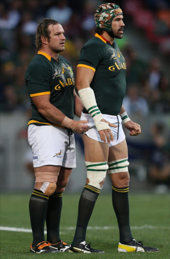 Jannie du Plessis of South Africa with Victor Matfield (captain) of South Africa during the Incoming Tour match between South Africa and Scotland at Nelson Mandela Bay Stadium on June 28, 2014 in Port Elizabeth, South Africa.