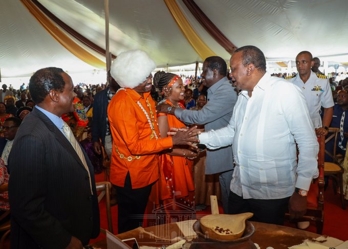 President Uhuru Kenyatta and opposition leader Raila Odinga congratulate Kirinyaga Governor Anne Waiguru and lawyer Kamotho Waiganjo on their wedding.