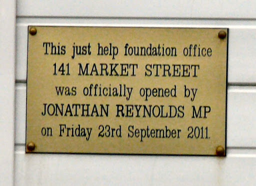 Plaque on 141 Market Street commemorating the opening of the just help foundation SJ9494 : Just Help Foundation supplementary school in September 2011 by local MP Jonathan Reynolds Link ©...