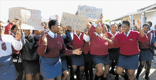 SO UNFAIR: Pupils at Sakhikamva High School in Nompumelelo township, Beacon Bay, shut down the school with a protest yesterday demanding the appointment of a life sciences teacher Picture: ARETHA LINDEN