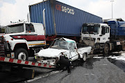 The accident scene on the N1 north near Northcliff, Johannesburg is pictured. The incident happened after a truck crashed into queuing traffic from another accident. The crash damaged 18 vehicles and three trucks which caused multiple injuries and a temporary closure of the highway. 