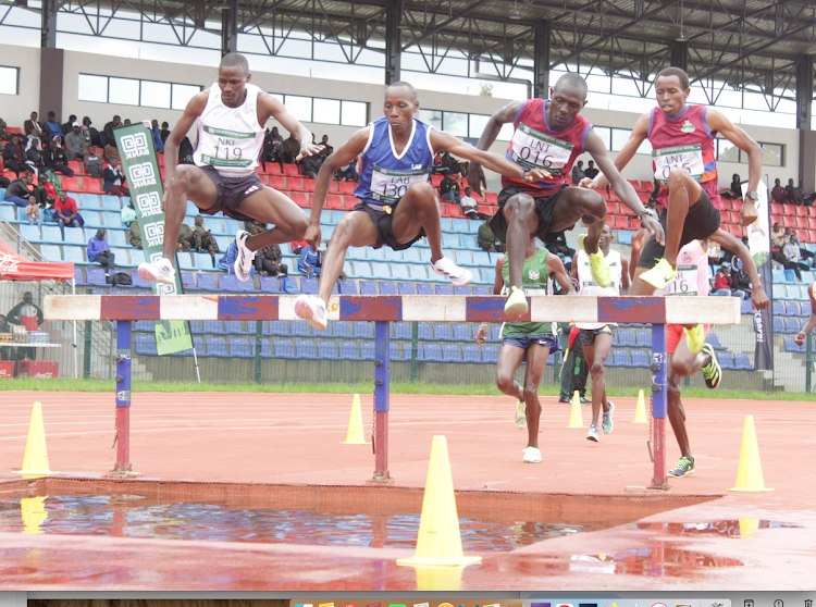 Simon Koech (2nd R) clears water barrier in the men’s 3,000m steeplechase during the KDF championships at Ulinzi Sports Complex on May 8, 2024/ TEDDY MULEI