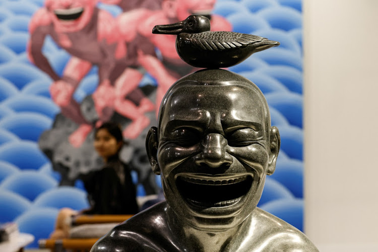An installation by Yue Minjun is displayed at Art Basel in Hong Kong, China, March 26 2024. Picture: REUTERS/Tyrone Siu