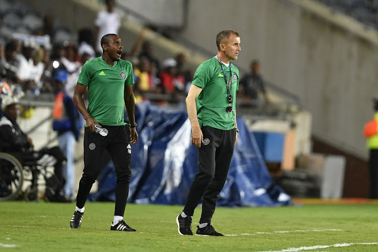Orlando Pirates assistant coach Rulani Mokwena and head coach Milutin Sredojevic during the CAF Champions League match between Orlando Pirates and Horoya at Orlando Stadium on January 18, 2019 in Johannesburg, South Africa.