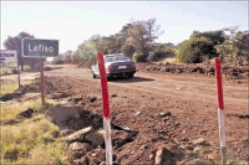 SCREECHING HALT: The upgrading of the Lefiso-Marapyane road has come to standstill because of a lack of funds. 17/05/09. Pic. Siyabonga Mosunkutu. © Sowetan.