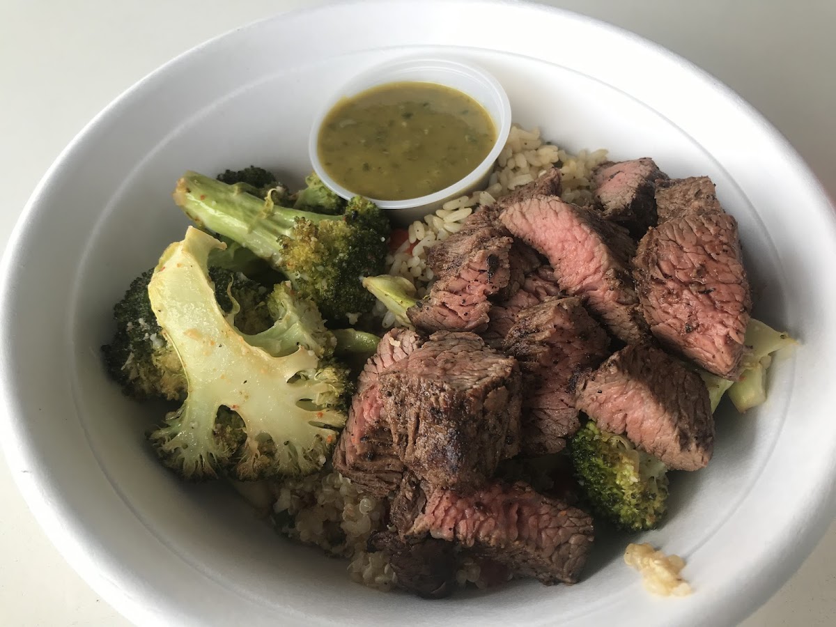 Perfect spice rice with veggie quinoa then topped with Parmesan broccoli and herb grilled steak ($1.50 up-charge) with the herb balsamic vinaigrette. So good!