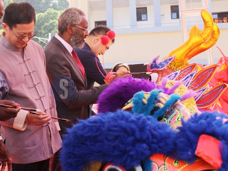 UoN vice chancellor Prof Stephen Kiama leads officials in Dragon painting at the University of Nairobi on February 7. 2024.
