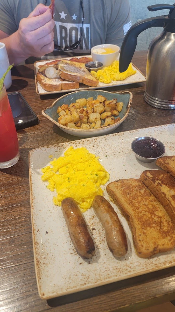 GF French toast with sausage, eggs and potatoes.