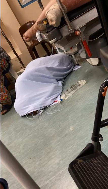 A screengrab from a video showing patients sleeping on the floor and on chairs at Wentworth Hospital.