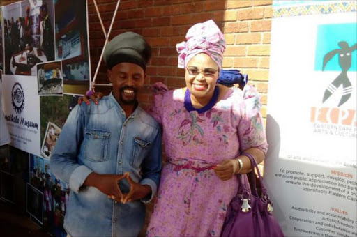 ENTREPRENEURIAL: Leather products manufacturer Xolisa ‘Bobo’ Mnqumevu is seen here with sport, recreation, arts and culture MEC Pemmy Majodina as she inspects some of his products Picture: SUPPLIED