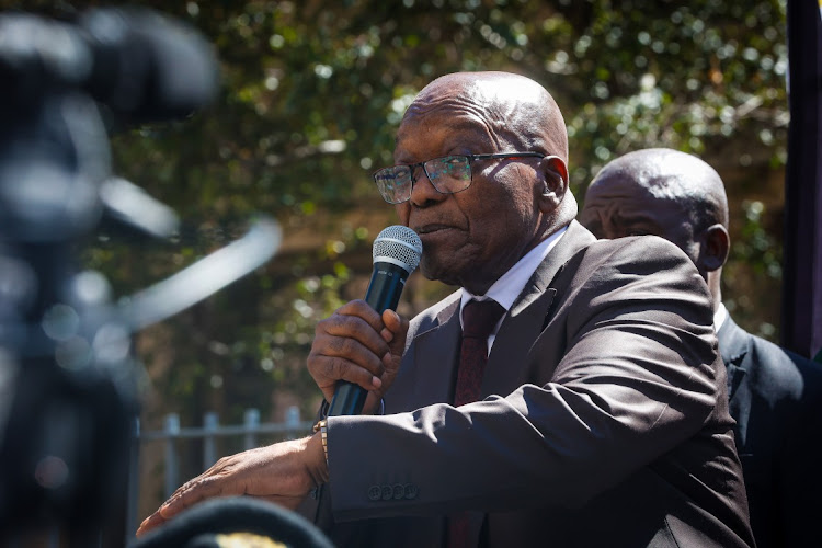 Jacob Zuma addressing supporters outside the Johannesburg high court after his private prosecution bid against Cyril Ramaphosa. / Thulani Mbele