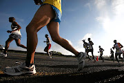 Running  should not be expensive, says the writer. 