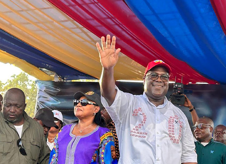 President of the Democratic Republic of Congo Felix Tshisekedi greets supporters during a party rally in Mbuji-Mayi.