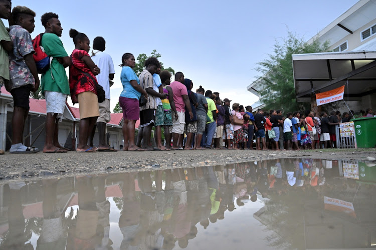 Voters queue at a polling station in Honiara, Solomon Islands, April 17 2024. Picture: AAP Image/Mick Tsikas/REUTERS