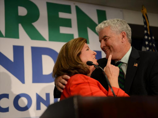 Karen Handel, Republican candidate for Georgia's 6th Congressional District, hugs husband Steve Handel during her acceptance speech at her election night party at the Hyatt Regency at Villa Christina in Atlanta, Georgia, U.S., June 20, 2017. /REUTERS