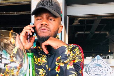 Rapper Kwesta can't believe how much that unknown man looks like him.