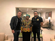 Nkosazana Dlamini-Zuma flanked by Adriano Mazzotti, left, and Carnilinx chief operating officer Mohammadh Sayed.