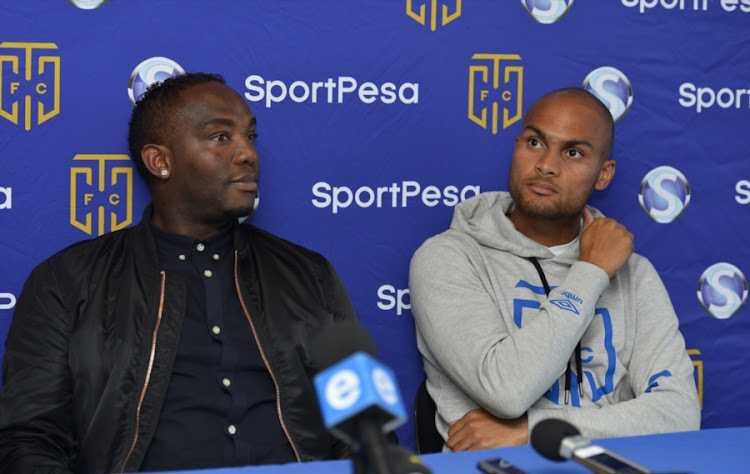 Cape Town City head coach Benni McCarthy (L) and club captain Robyn Johannes during a press conference at Cape Town Stadium on September 11, 2017 in Cape Town, South Africa.