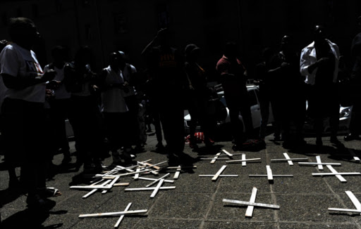 Families, relatives and community members gather for a prayer vigil in remembrance of 37 psychiatric patients on October 27, 2016 in Johannesburg, South Africa. File photo. Christine Nxumalo, the sister of one of the patients who died, has accused Qedani Mahlangu of cowardice after the health MEC resigned, saying "Resigning is a cowardly act‚ I am not surprised. I am yet to stand in front of her. She needs God in her life. I don’t know how she sleeps every day."