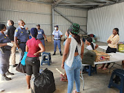 An investigation by a team from the department of economic development, tourism and environmental affairs led to the rescue of 14 workers, who were locked in a Durban factory and made to produce masks in response to the coronavirus pandemic, and the arrest of the factory owner on Sunday.