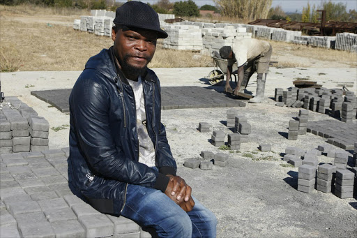 JULY 15,2016, Professor Mulalo Doyoyo who is the inventor of machines that makes different kind of bricks at his plant in Midrand, Pic: Mabuti Kali © Sowetan /Sunday World